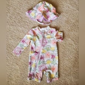 Floral zip-up swimsuit with matching hat